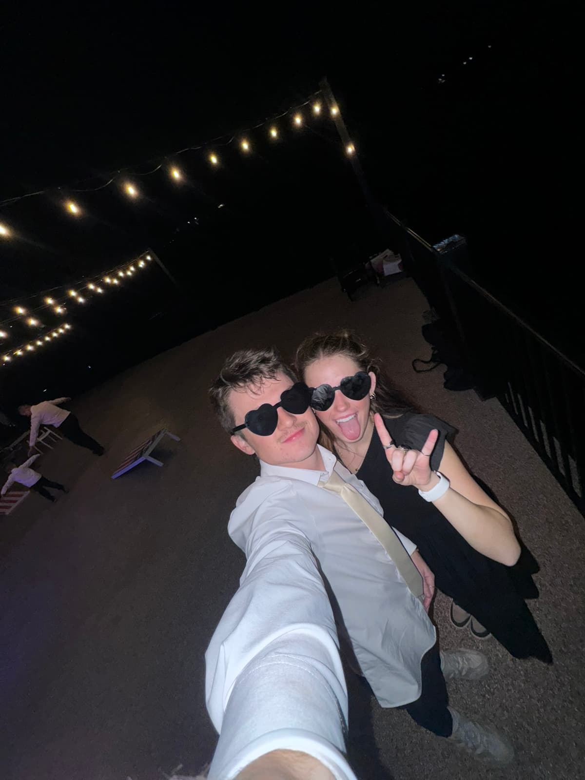 Jett and his wife at a wedding