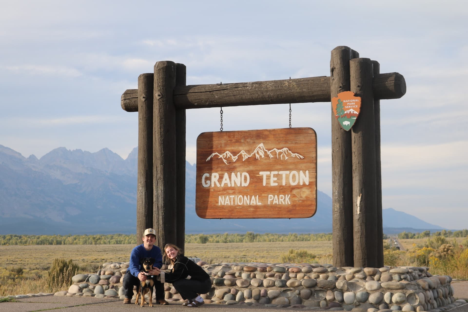 Another shot at the park entrance sign with the dog