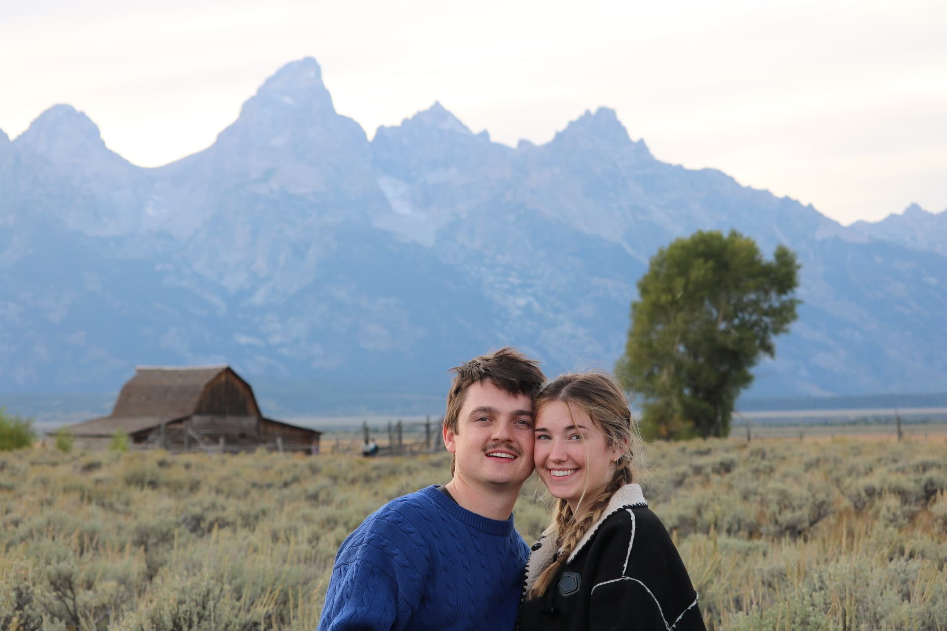 Cheek to cheek in front of the old barn