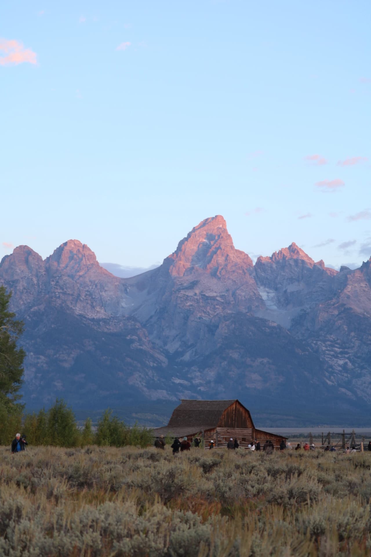 Photographers gathered for sunset at the Mormon Row barn